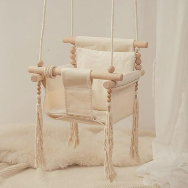 Connect with nature's playground through our wholesale wooden baby swing